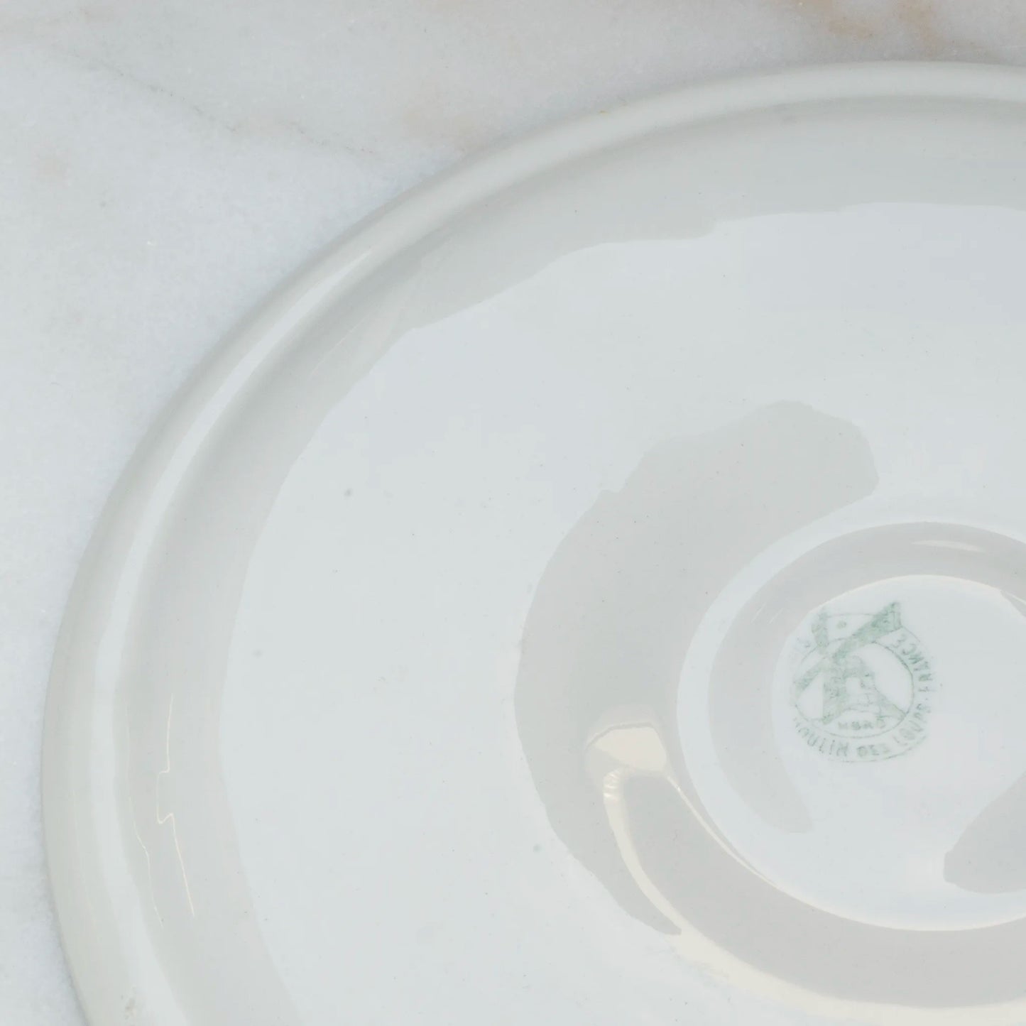 Monsieur Marcel grey oyster plate reverse with brand stamp