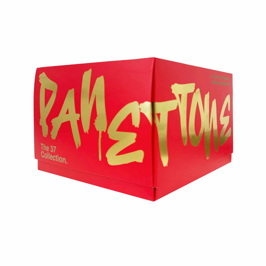 Red box with gold 'Pantone' with forest berries and white chocolate