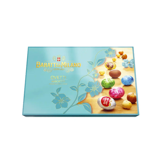 Baratti & Milano assorted small chocolate Easter eggs 275g in a light blue gift box with colorful foil-wrapped eggs.