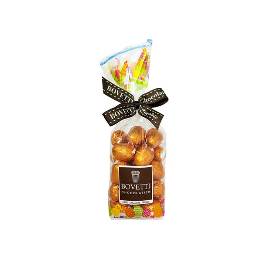 Bovetti Chocolatier Easter chocolate eggs with caramel 200g in a clear gift bag with gold foil wrapping.