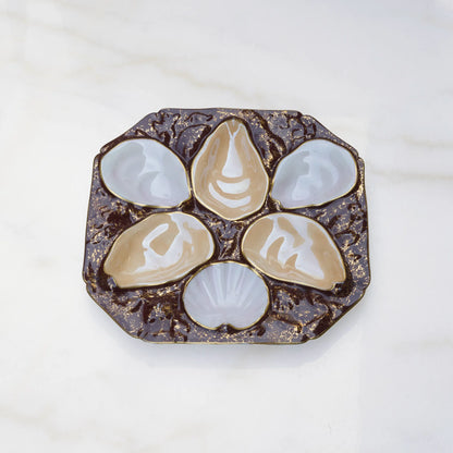 Oscar Gutherz oyster plate in brown with gold accent details