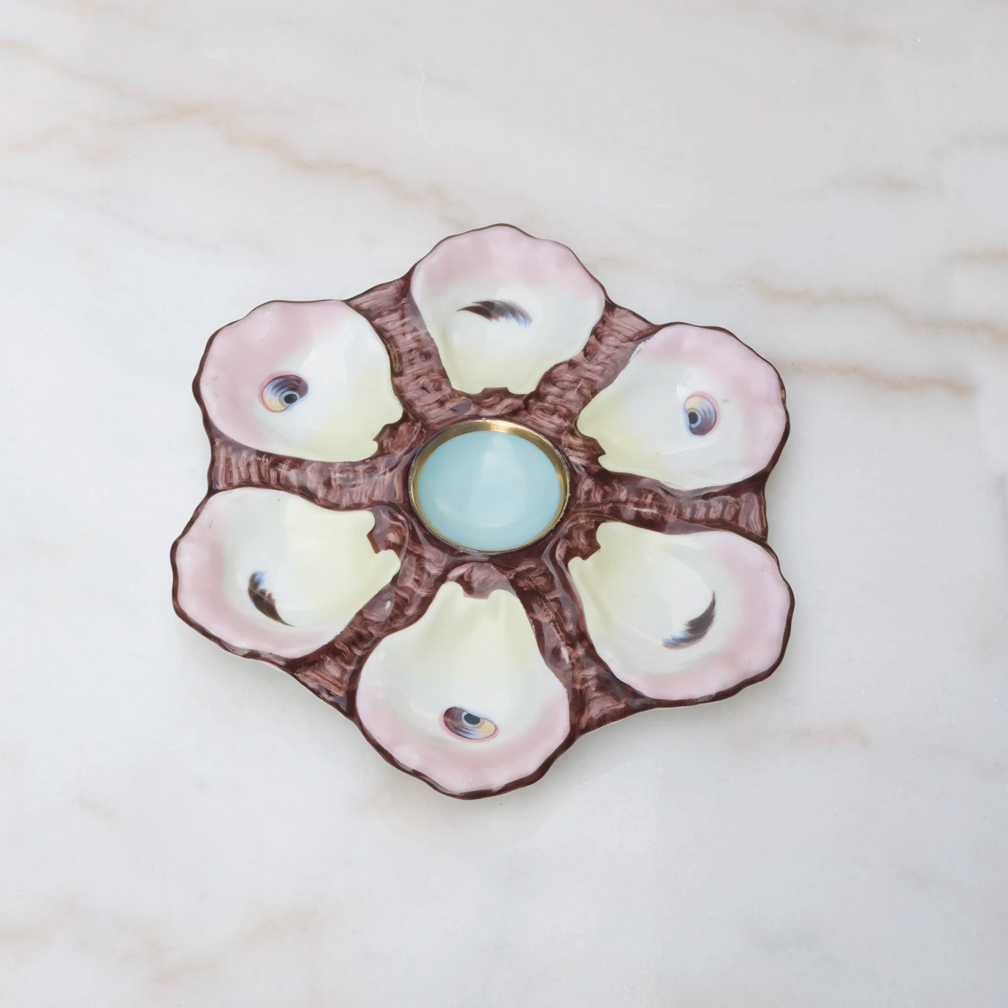 Vintage Limoges oyster plate with elegant mauve accent glaze