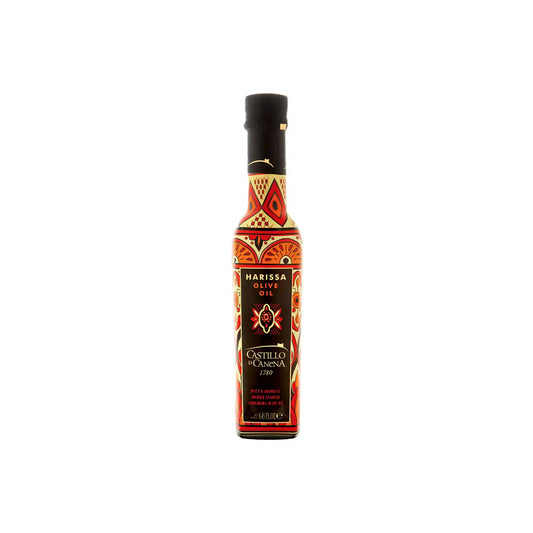 Castillo de Canena harissa-infused olive oil in a 250ml bottle with ornate red and gold Moorish design.
