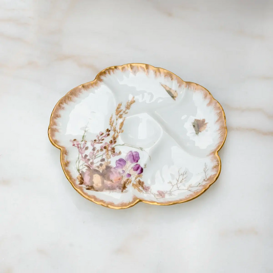 Limoges porcelain oyster plate with conch shell and purple flowers