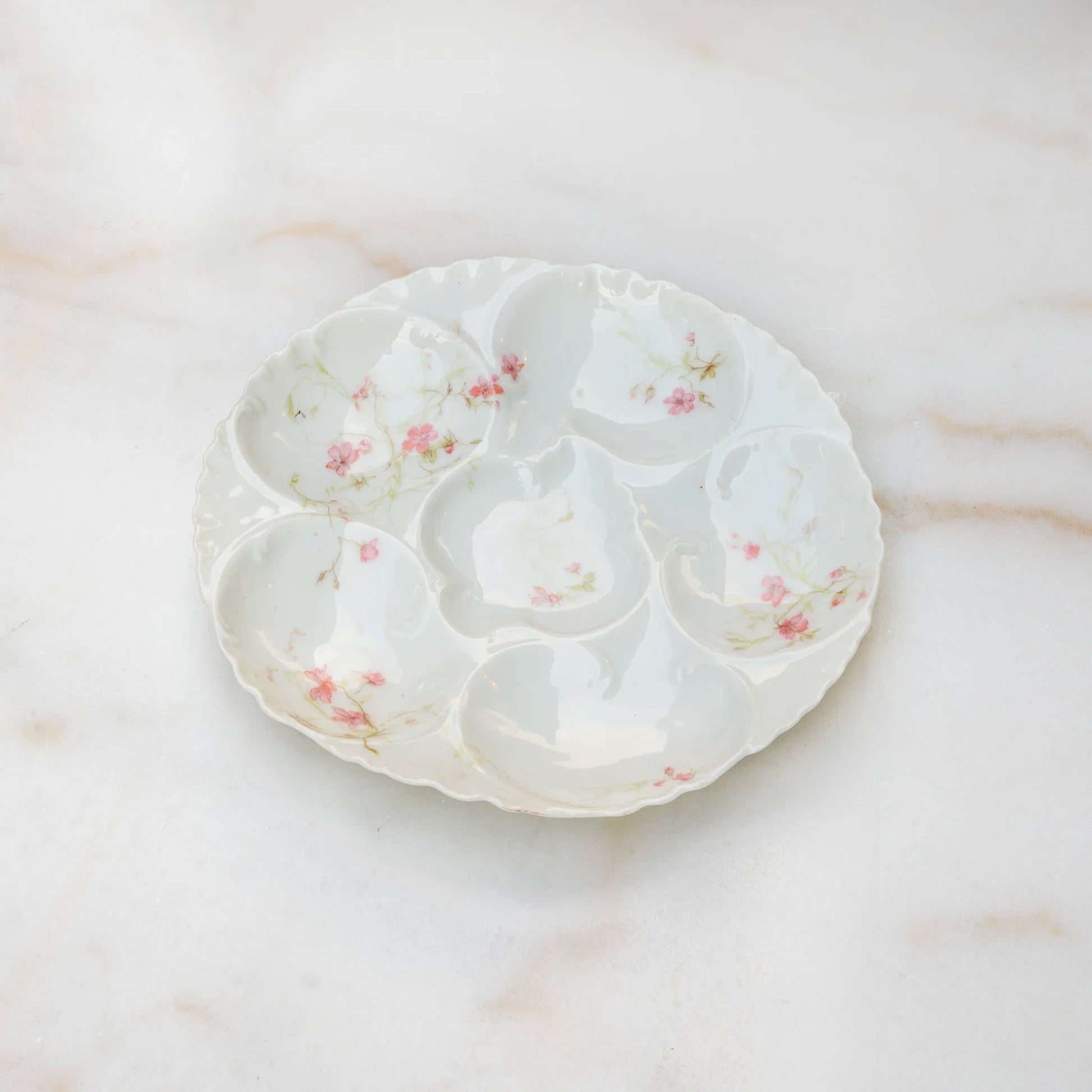 19th century Limoges oyster plate with dark pink floral pattern