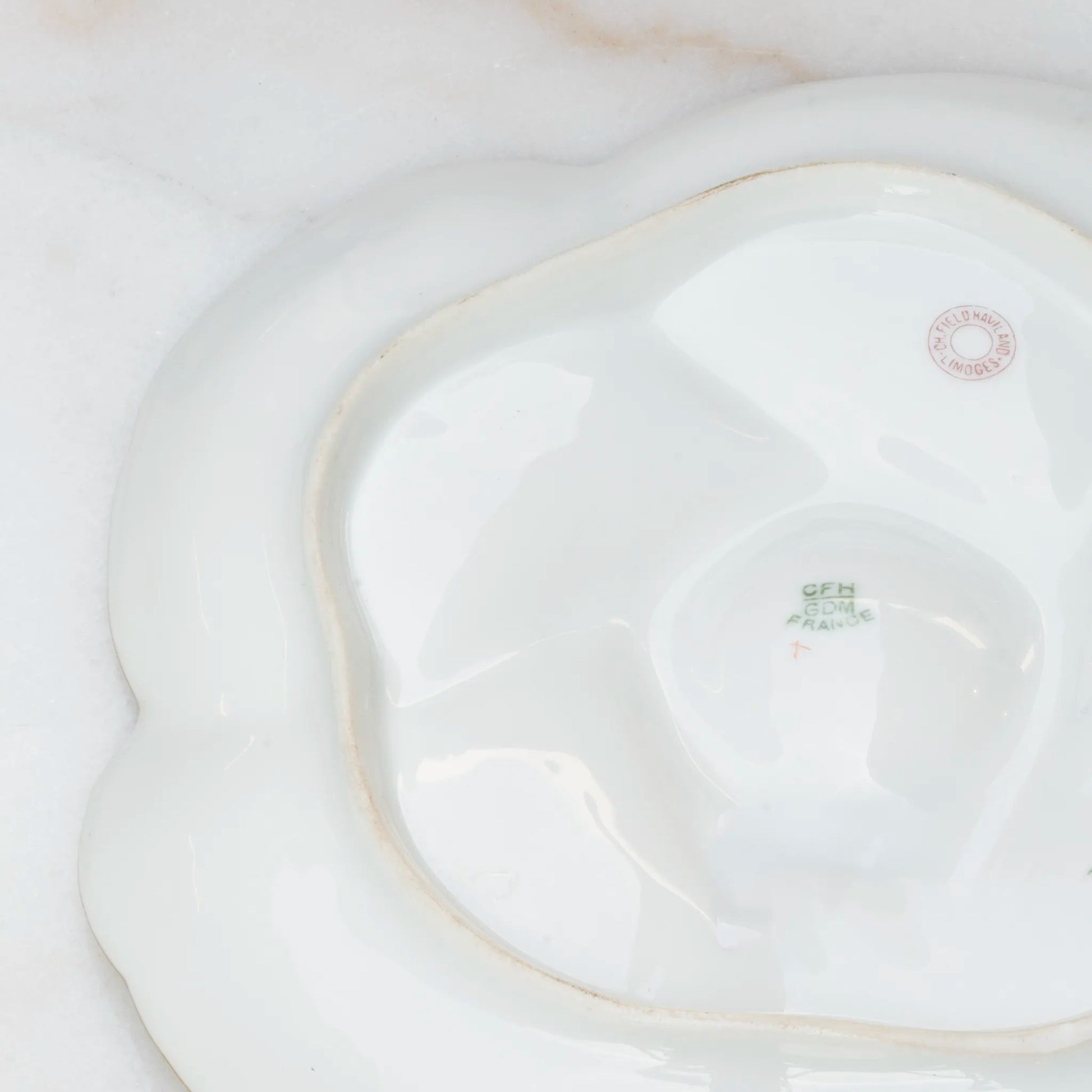 Limoges floral oyster plate reverse with gold accent detail