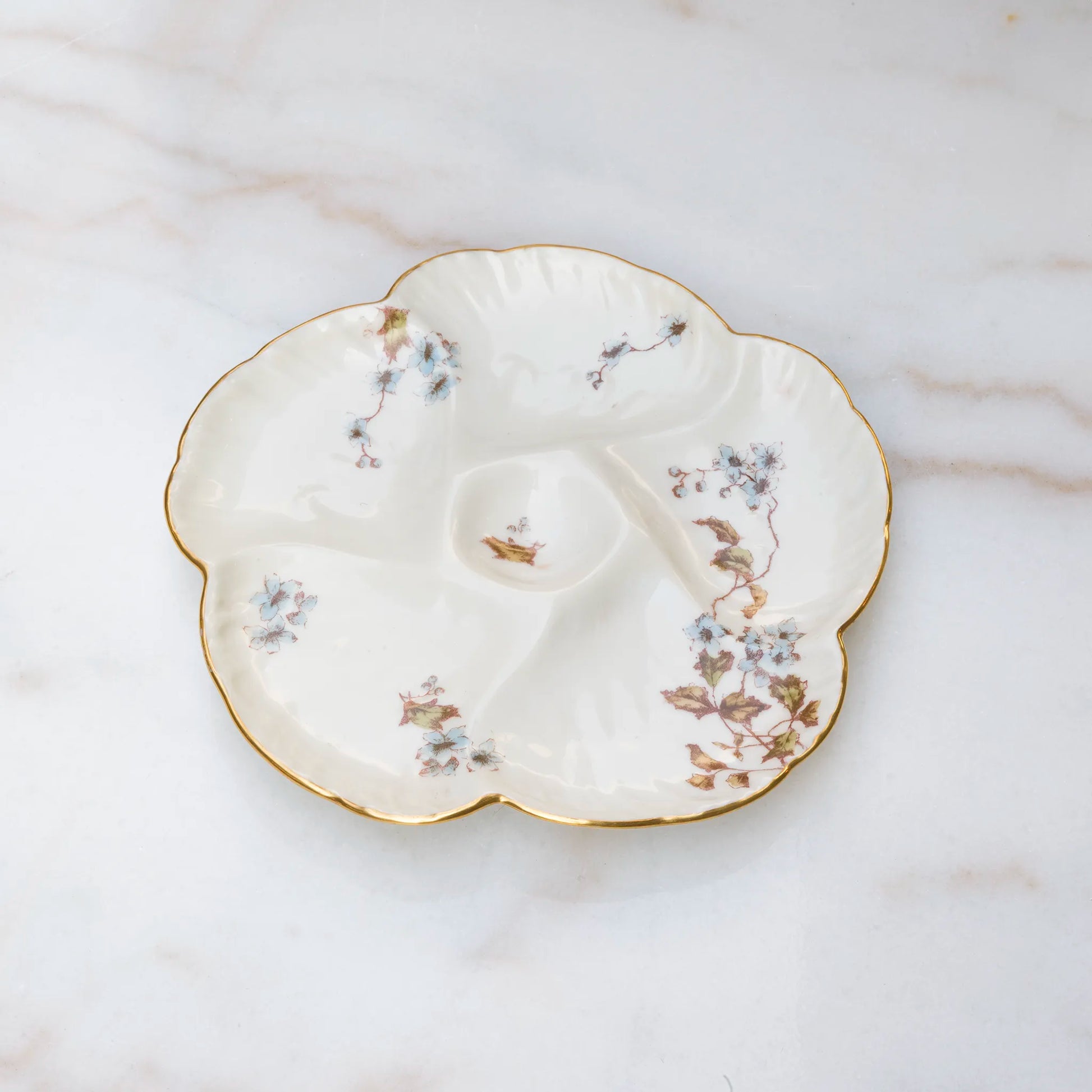 Limoges floral oyster plate with hand painted blooms and gold