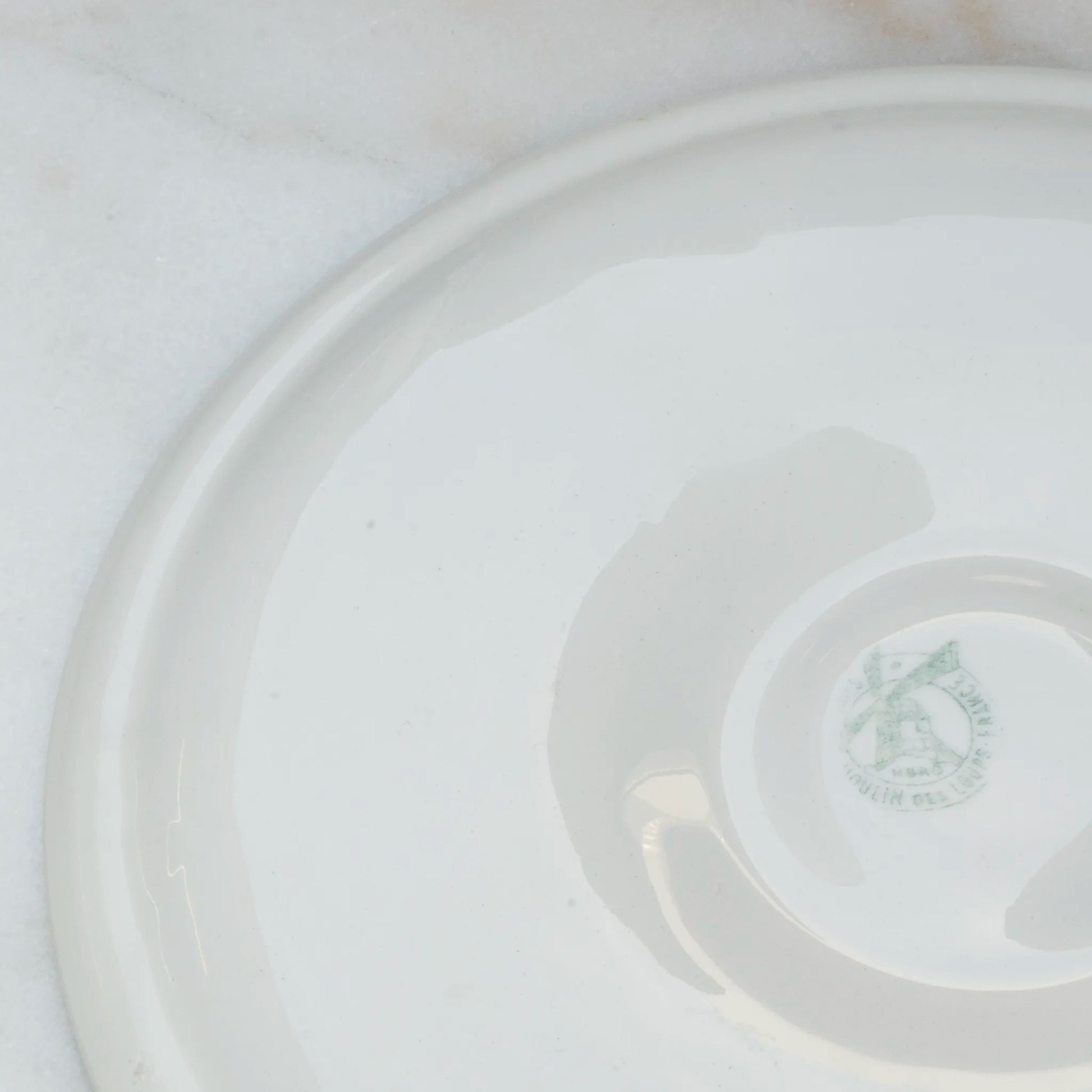 Monsieur Marcel grey oyster plate reverse with brand stamp
