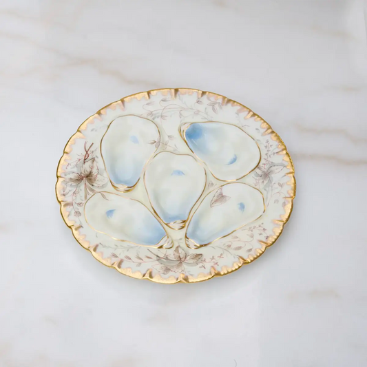 Vintage Haviland Limoges oyster plate with blue floral design and gold trim