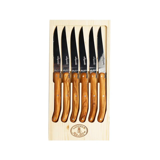 Set of six steak knives with wooden handles in a wooden box, featuring the Laguiole brand.