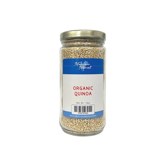 Monsieur Marcel organic quinoa in a clear 10oz glass jar with blue label.