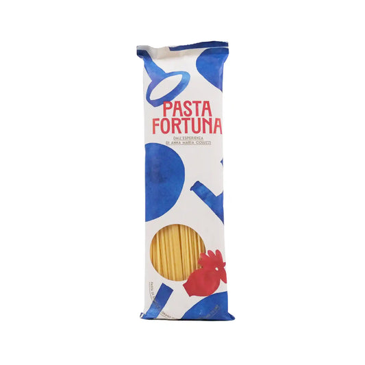 Pasta Fortuna spaghetti quadrati in a blue and red graphic designed bag, 500g.