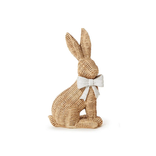 Two's Company wicker bunny figurine with a white striped bow, handwoven rattan Easter decoration.