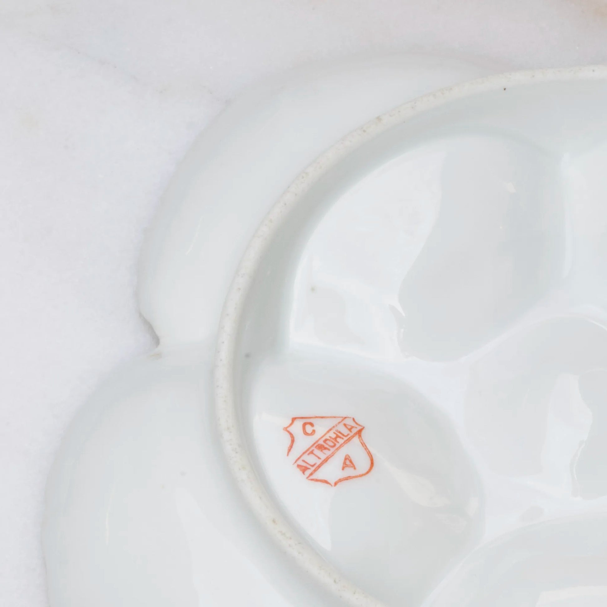 Austrian yellow oyster plate underside with porcelain stamp