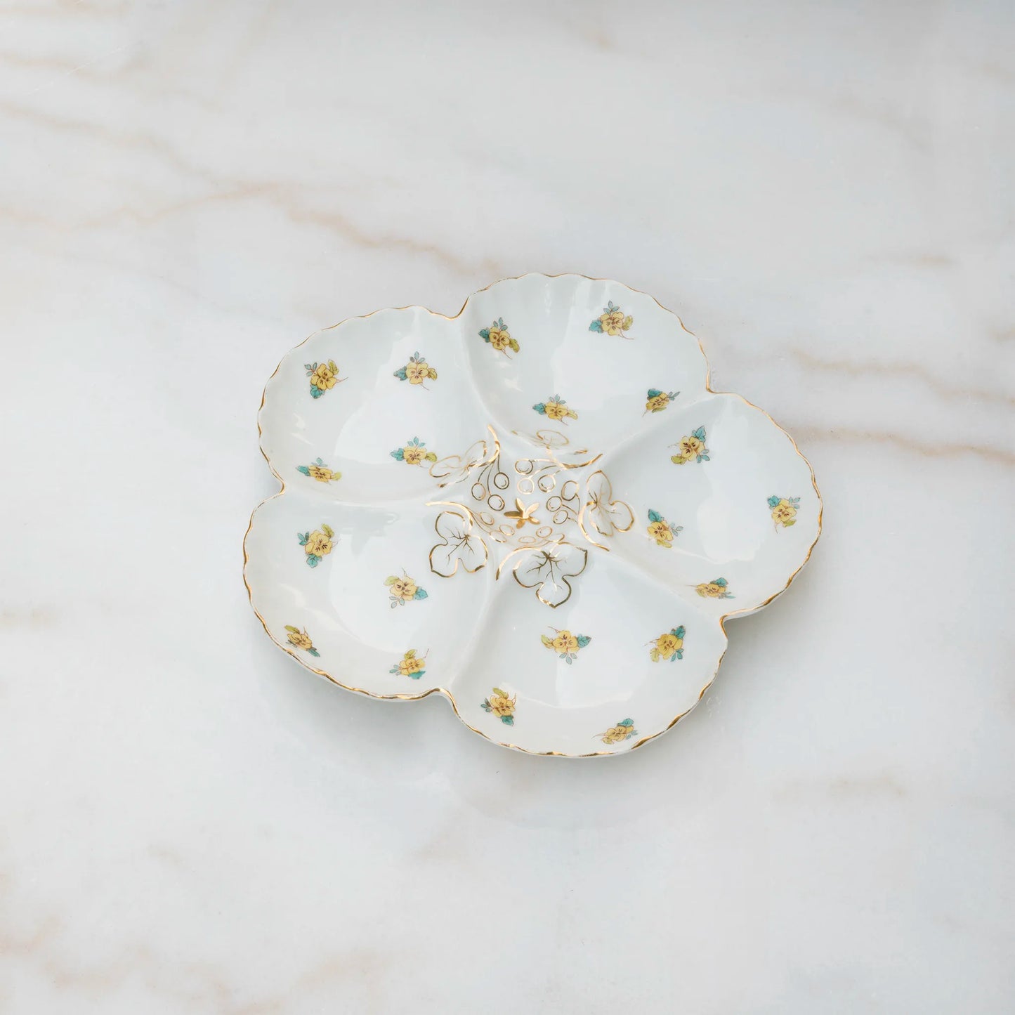 Austrian oyster plate in warm yellow glaze with shaped wells