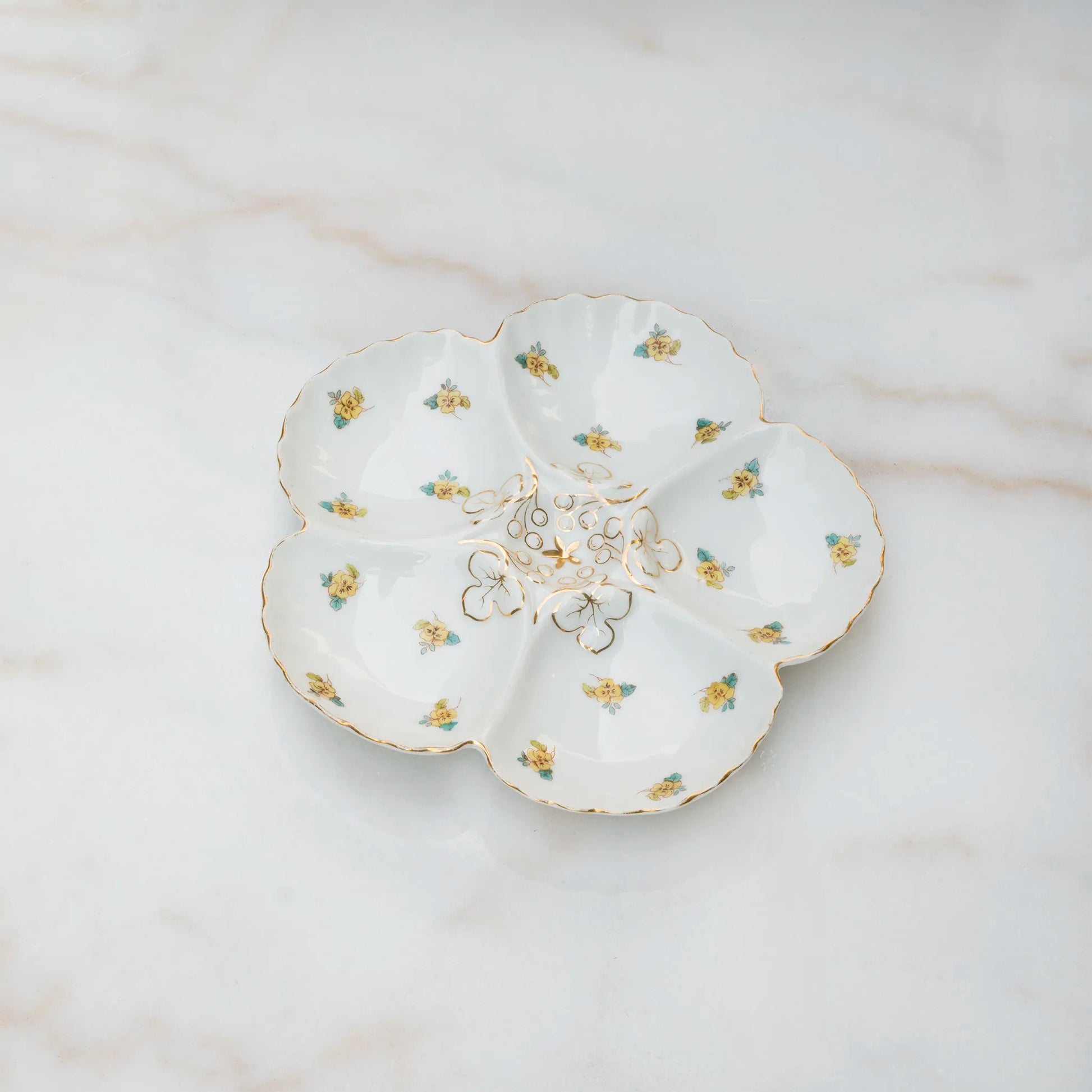 Austrian oyster plate in warm yellow glaze with shaped wells